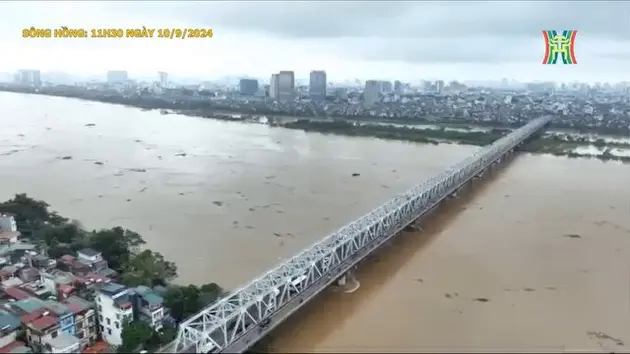 Lũ tr&ecirc;n s&ocirc;ng Hồng tại H&agrave; Nội vượt mức b&aacute;o động 1
