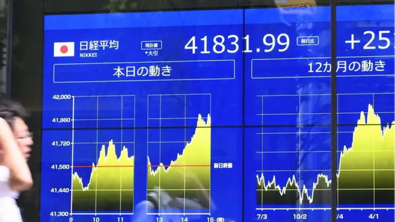 Cổ phiếu, vàng tăng giá nhờ kỳ vọng Fed hạ lãi suất
