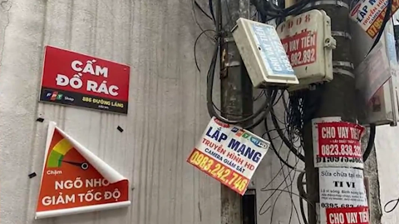 Phạt tới 20 triệu đồng hành vi dán quảng cáo trên cột điện