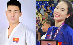 Hai VĐV cầm cờ cho Đoàn thể thao Việt Nam tại SEA Games 33