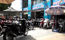 Chợ xe máy cũ 'ảm đạm' sau lệnh cấm xe xăng, dầu
