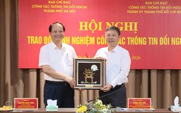 Hà Nội và TP HCM trao đổi kinh nghiệm công tác thông tin đối ngoại