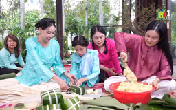 Hoa hậu Hà Kiều Anh gói bánh chưng cùng con